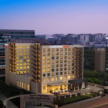 Отель Courtyard By Marriott Bengaluru Outer Ring Road Экстерьер фото